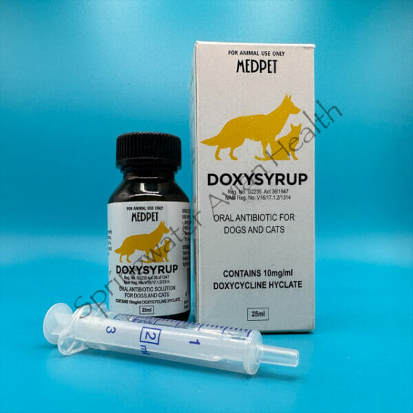 Doxysyrup box, bottle and dosing syringe.